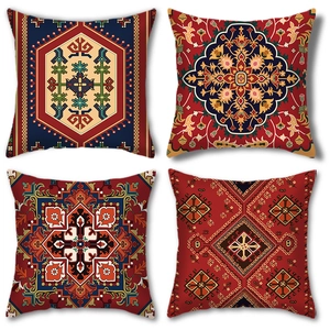 Detailed close-up of four Persian style pillow covers with colorful ethnic patterns
