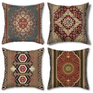 Detail view of four bohemian cushion covers with Persian and mandala patterns