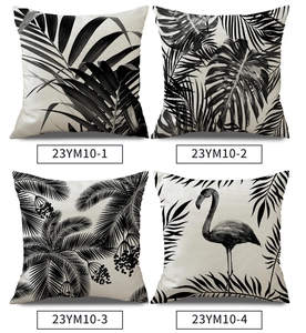 Close-up of linen pillow covers with tropical palm leaves and flamingo patterns in 2x2 grid