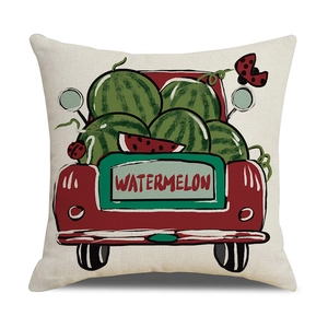 Detail of linen pillowcase with red truck carrying watermelons and printed text
