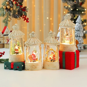 Lighted Christmas lantern water globe with Santa and Snowman holiday scenes