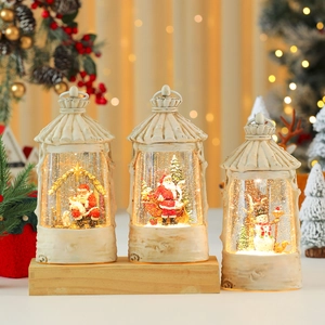 Vintage Christmas snow globe lanterns with Santa and snowman scenes for festive decor