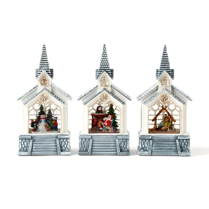 Three decorative Christmas church lanterns featuring Santa, a snowman, and a nativity scene
