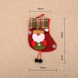 Close-up of a Christmas stocking with 3D Santa Claus figure and detailed size markings