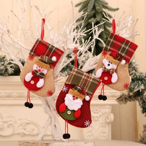 Christmas stocking set with 3D Santa and snowman hanging on white branches