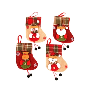 Set of 4 Christmas stockings featuring Santa, Snowman, Reindeer, and Bear designs