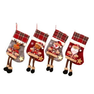 Set of 4 Christmas plaid stockings featuring Santa Snowman Reindeer and Bear figures