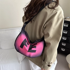 Chic half-moon crossbody bag with pink gradient and FE logo on wide fabric strap