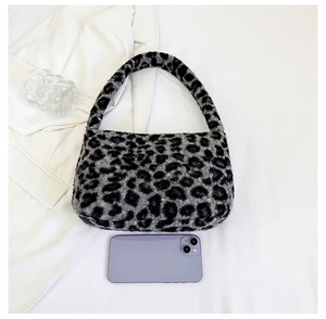 Capacity view of leopard plush shoulder bag with smartphone for size reference