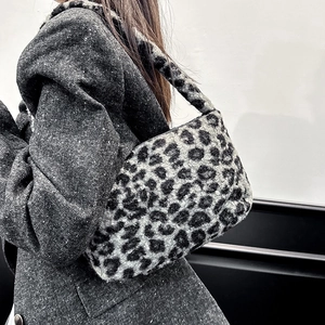 Faux fur leopard print shoulder bag for women with spacious winter wool-like texture
