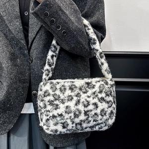 Chic black and white leopard print faux fur shoulder bag for autumn and winter fashion
