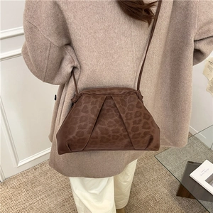 Stylish leopard print dumpling bag with gathered pleats and a slim crossbody strap