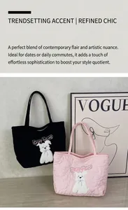 Close-up of heart-shaped quilting and cute cartoon dog embroidery on soft tote bags