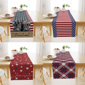 Detail of four patriotic table runners featuring stars, stripes, and America themed prints