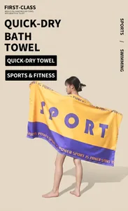 Macro shot of quick-dry microfiber sport beach towel with yellow and purple contrast color