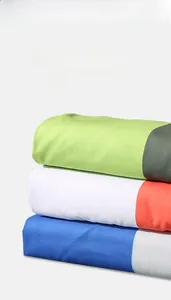 Macro detail of sand-free microfiber beach towel fabric with reactive printing texture