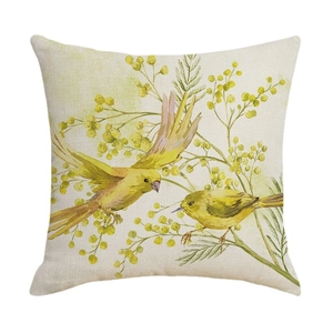 Floral bird decorative throw pillow cover in rustic linen style on white background