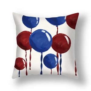 Detailed texture of Independence Day pillow cover featuring red and blue watercolor balloons