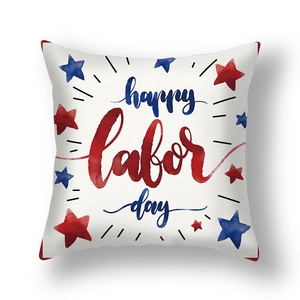 Detail of happy labor day pillow cover with watercolor stars and red blue text