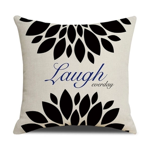 Detailstruktur des Kissenbezugs aus Leinen mit Laugh everyday Blumendruck Design