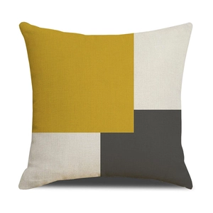 Detailed texture of abstract geometric linen pillowcase with mustard yellow and grey panels