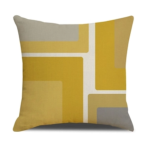 Detail of Nordic geometric linen pillowcase with yellow and grey abstract block pattern