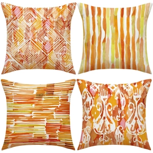 Detailed set of 4 linen pillow covers featuring orange watercolor geometric patterns