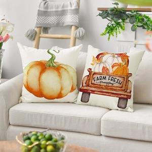 Linen autumn throw pillow covers featuring watercolor pumpkin and vintage farm truck design