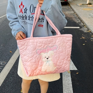 Pink heart quilted tote bag featuring a white cartoon puppy and comfortable soft padding