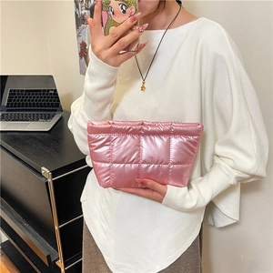 Pink quilted square clutch bag with a metallic satin finish for versatile daily storage