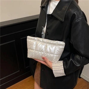Chic white quilted faux leather clutch bag with elegant pearl finish and puffy diamond pattern