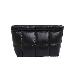 Minimalist black quilted puffer handbag with high gloss finish and soft space cotton padding