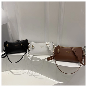 Three minimalist PU leather crossbody bags in black white and brown with gold hardware