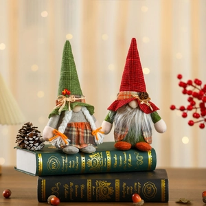 Christmas faceless gnomes set with red and green hats and plaid outfits on books
