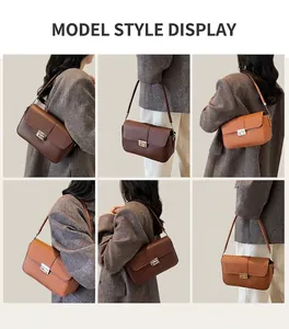Detail view of stylish leather crossbody bag with silver buckle and sleek rectangular shape