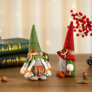 Pair of festive Christmas gnomes with burlap hats, pine cones, and berries decor