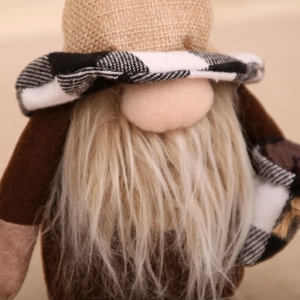 Close-up of rustic coffee gnome with burlap hat, checkered brim and long faux fur beard