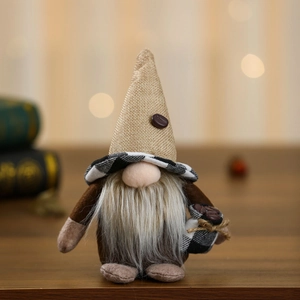 Detail shot of coffee gnome ornament with burlap hat, plush beard and mini coffee bean bag