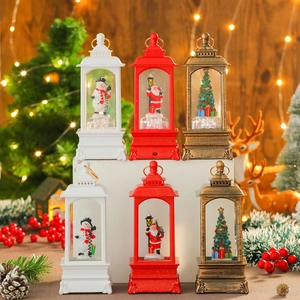 Three Christmas lanterns with Santa, snowman and tree scenes in white, red and gold colors