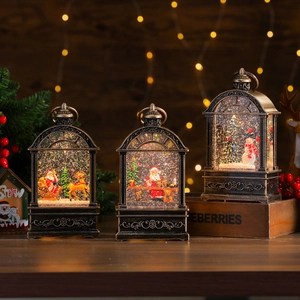 Vintage bronze Christmas lanterns with musical scenes and glowing glitter interior lights