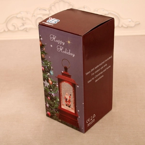 Deep red festive packaging box for Christmas lantern with technical specs and holiday graphics