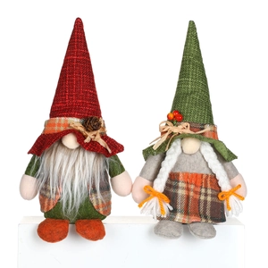 Handmade fall harvest gnome plush dolls with knit hats and berries for holiday home decor