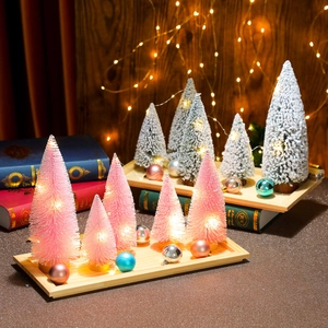 Mini lighted Christmas tree set with pink sisal trees and LED lights in wooden trays