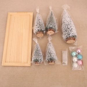 DIY Christmas tree kit with mini snow flocked trees, wooden tray, and pearl ornaments