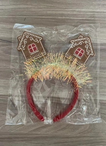 Détail du serre-tête maison en pain d'épices de Noël avec paillettes sous emballage