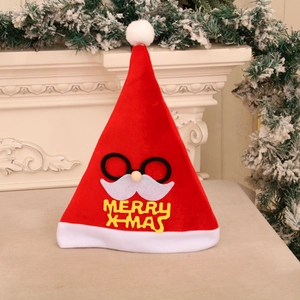 Detail of red Santa hat with mustache applique and yellow Merry X-Mas 3D text decoration