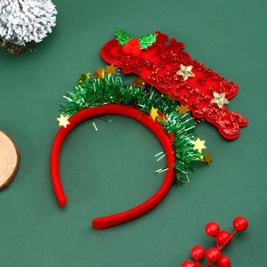 Red Merry Christmas headband with green tinsel and gold stars for festive party decor
