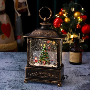 Close-up of retro Christmas lantern water globe with Santa and swirling glitter