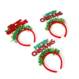 Three-piece Merry Christmas headband set with red velvet, green tinsel, and glittery stars