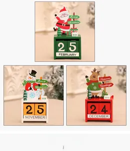 Detail of Christmas wooden advent calendar featuring Santa and reindeer motifs